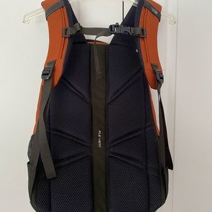 The North Face Orange and Black Backpack